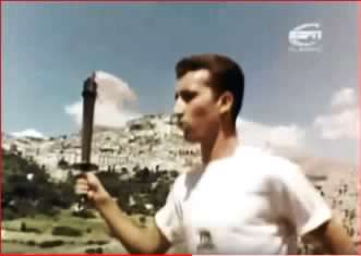 muro-lucano-1960-primo-piano-del-tedoforo-con-sullo-sfondo-il-panorama-di-muro